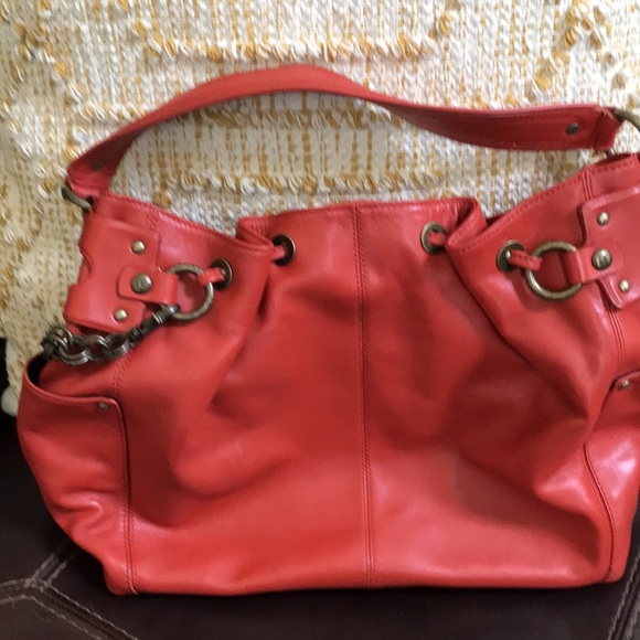 Orange leather handbag Donald J Pilsner